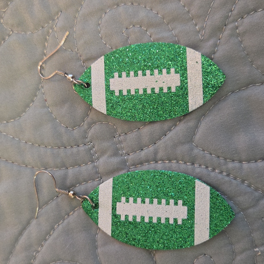 **DONATE 04/19**  NIP GREEN GLITTER FOOTBALL EARRINGS